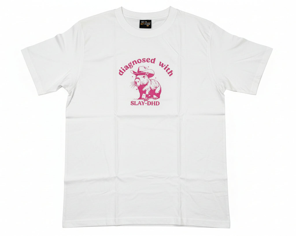 White t-shirt with printed pink graphic and text